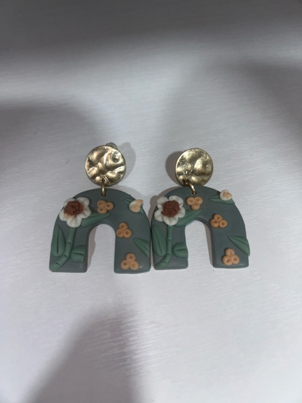 Hand Crafted Dusty Green Floral Arch Earrings with Gold Tops